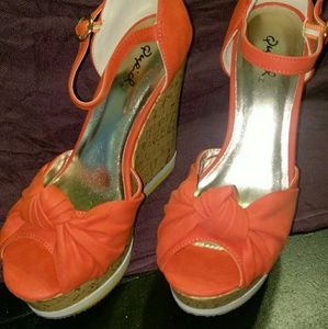 Brand new! Orange wedge heels